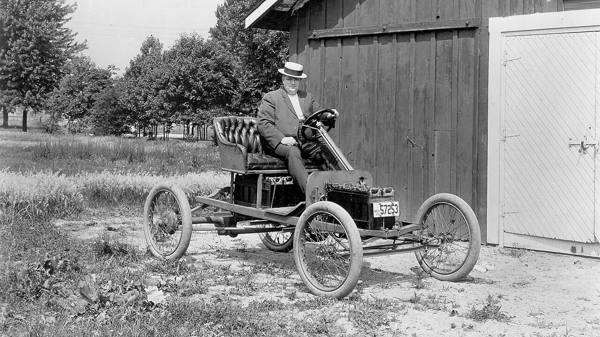 Fred Allison, an Electrical Engineer, with a Ford experimental electric car (1914)