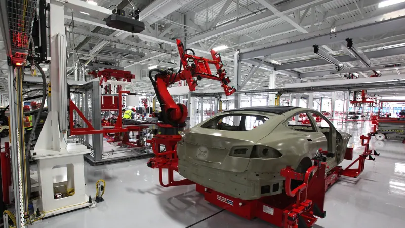 Tesla Model S body shell on a robotic assembly line